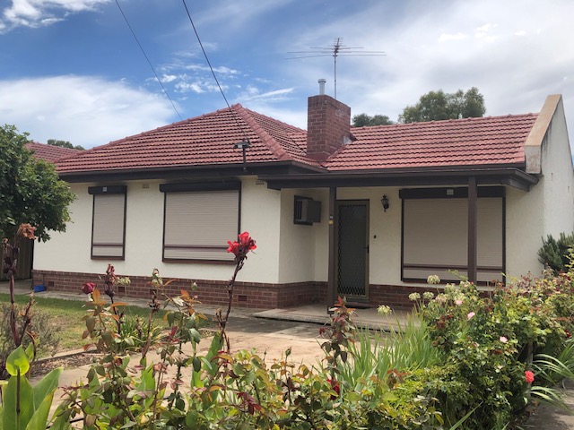 Roof before restoration - worn and weathered tiles